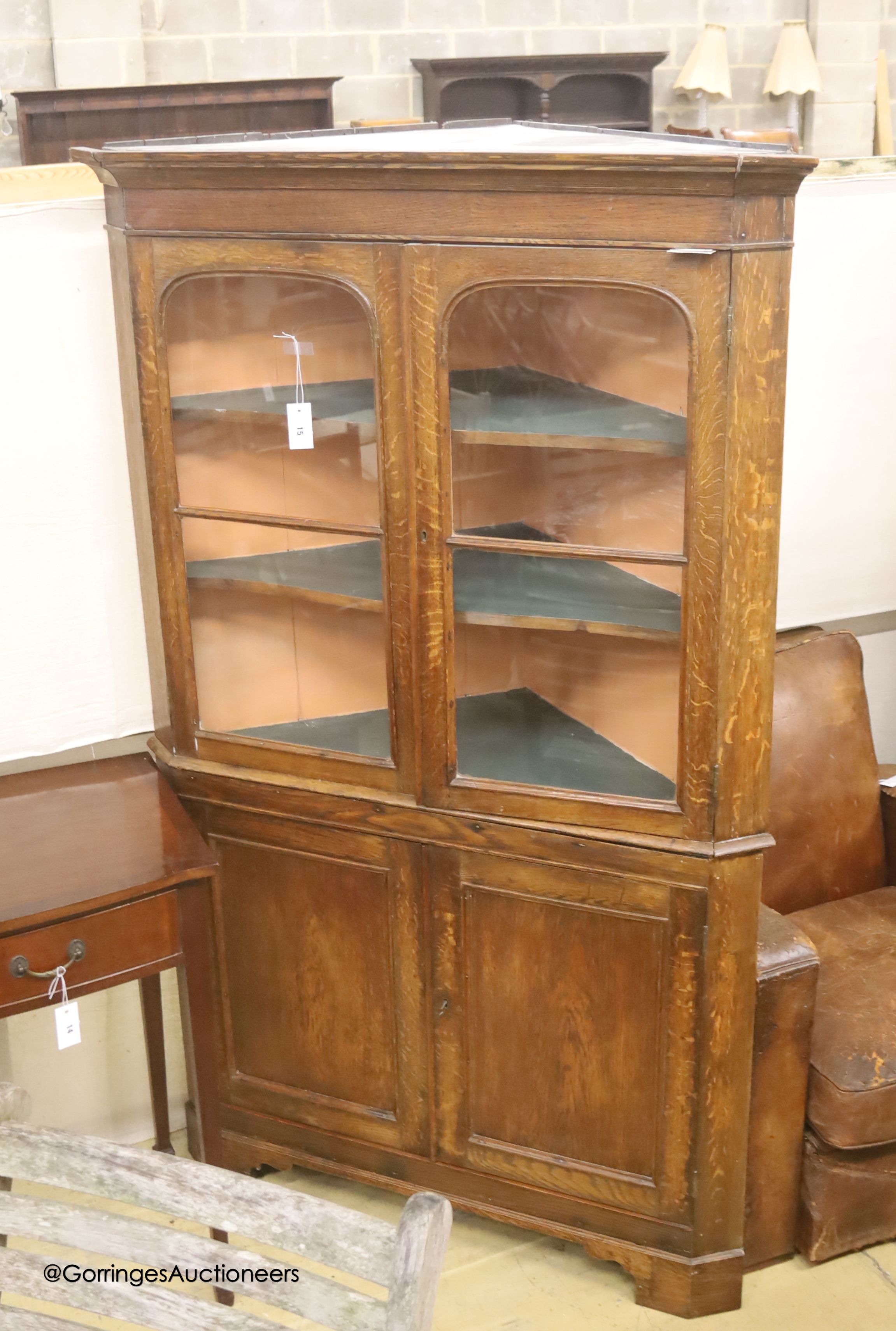 A 19th century oak standing corner cupboard, length 112cm, depth 51cm, height 190cm